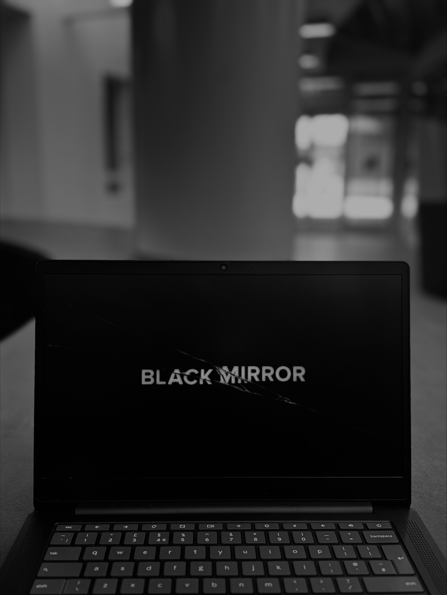 laptop watching black mirror